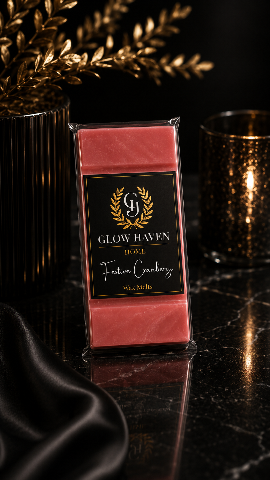 Glow Haven Festive Cranberry snap bar wax melt in cranberry red soy wax beside a glowing candle