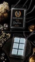 Glow Haven Baby Powder clam shell wax melt: labelled pack and open tray of six pale blue soy wax cubes